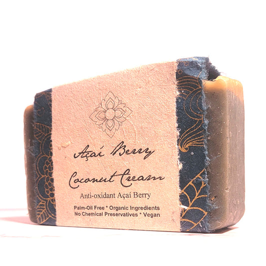 Bar of soap with decorative packaging and text on a white background